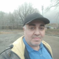 Николай