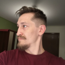 Николай