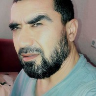 Али