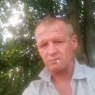 Николай