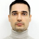 Николай