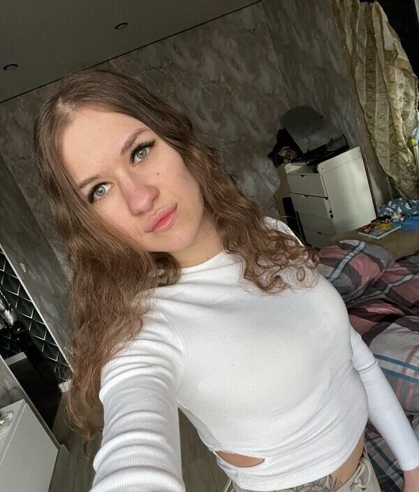 Оля
