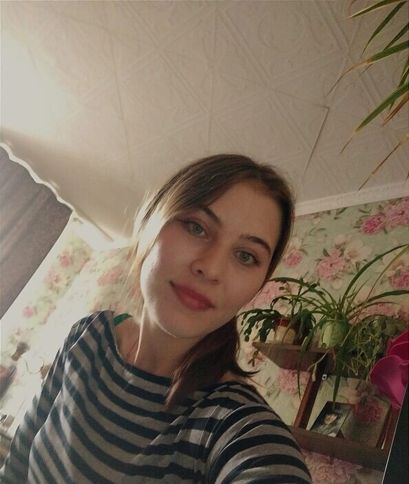 Оля