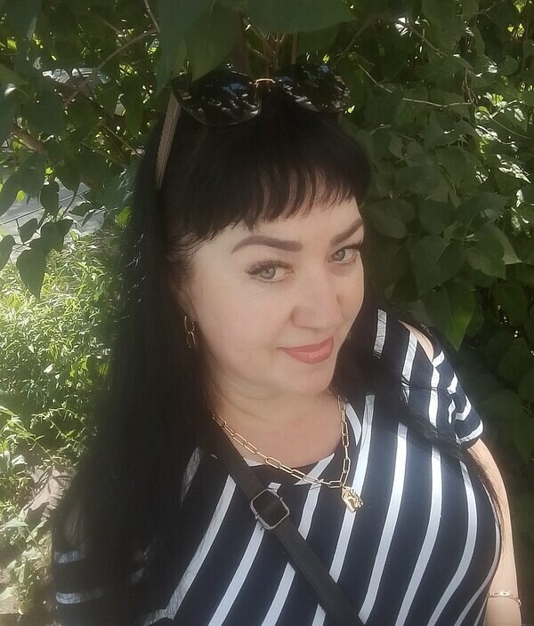 Мила