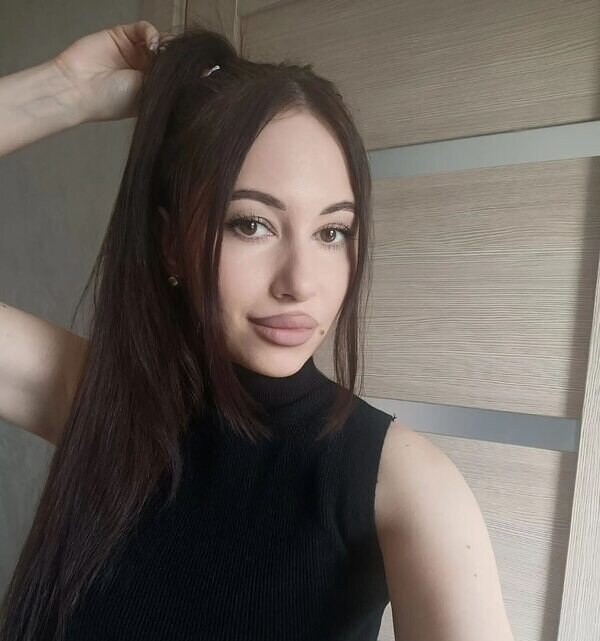 Оля