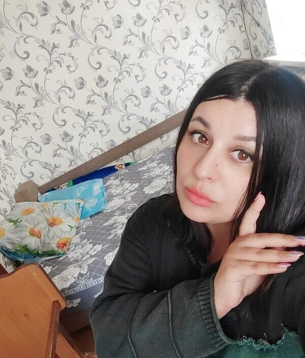 Оля
