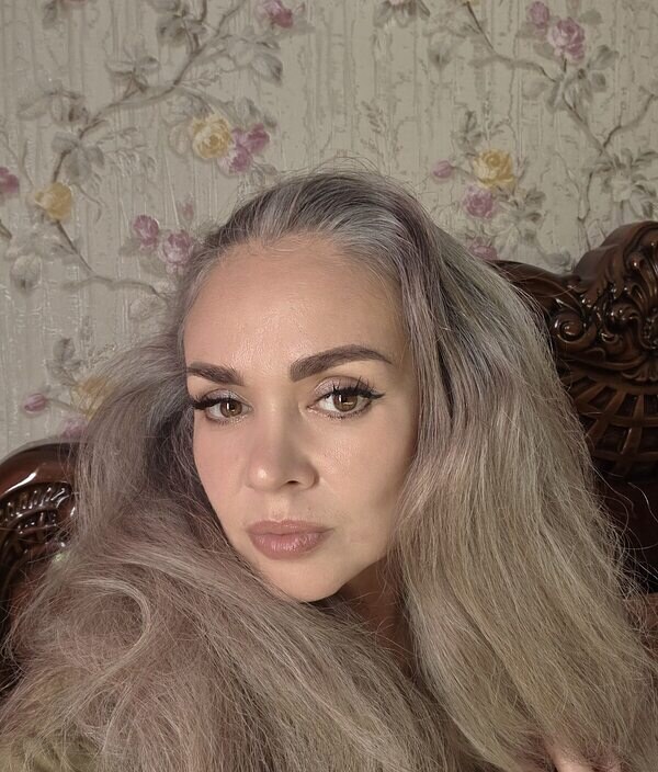 Мила