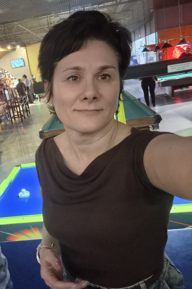 Мила