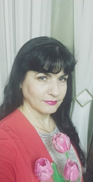 Мила