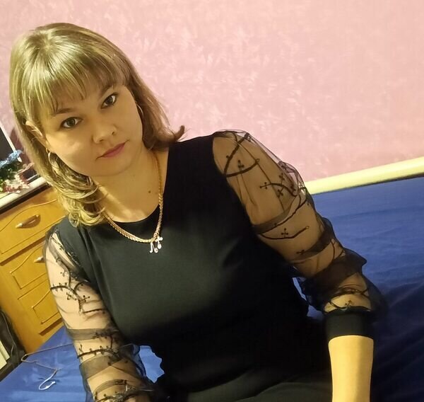 Мила